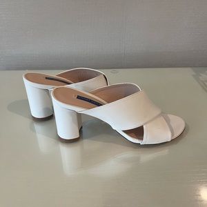 Stuart Weitzman white leather slides. Size 7. Excellent condition.